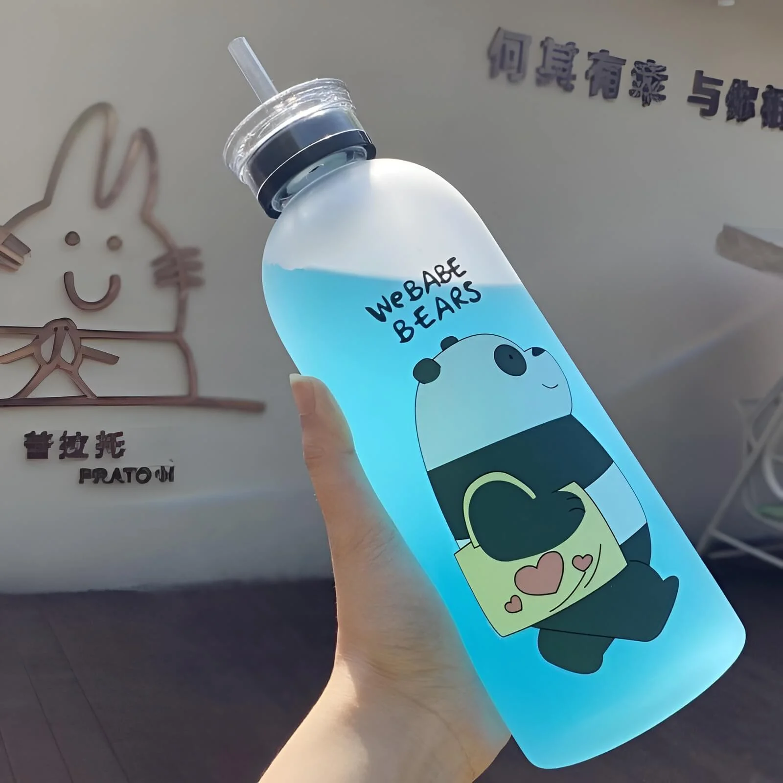 “Panda Bear frosted plastic water bottle with straw lid, lightweight kids bottle with cartoon design and easy drinking system for daily use”