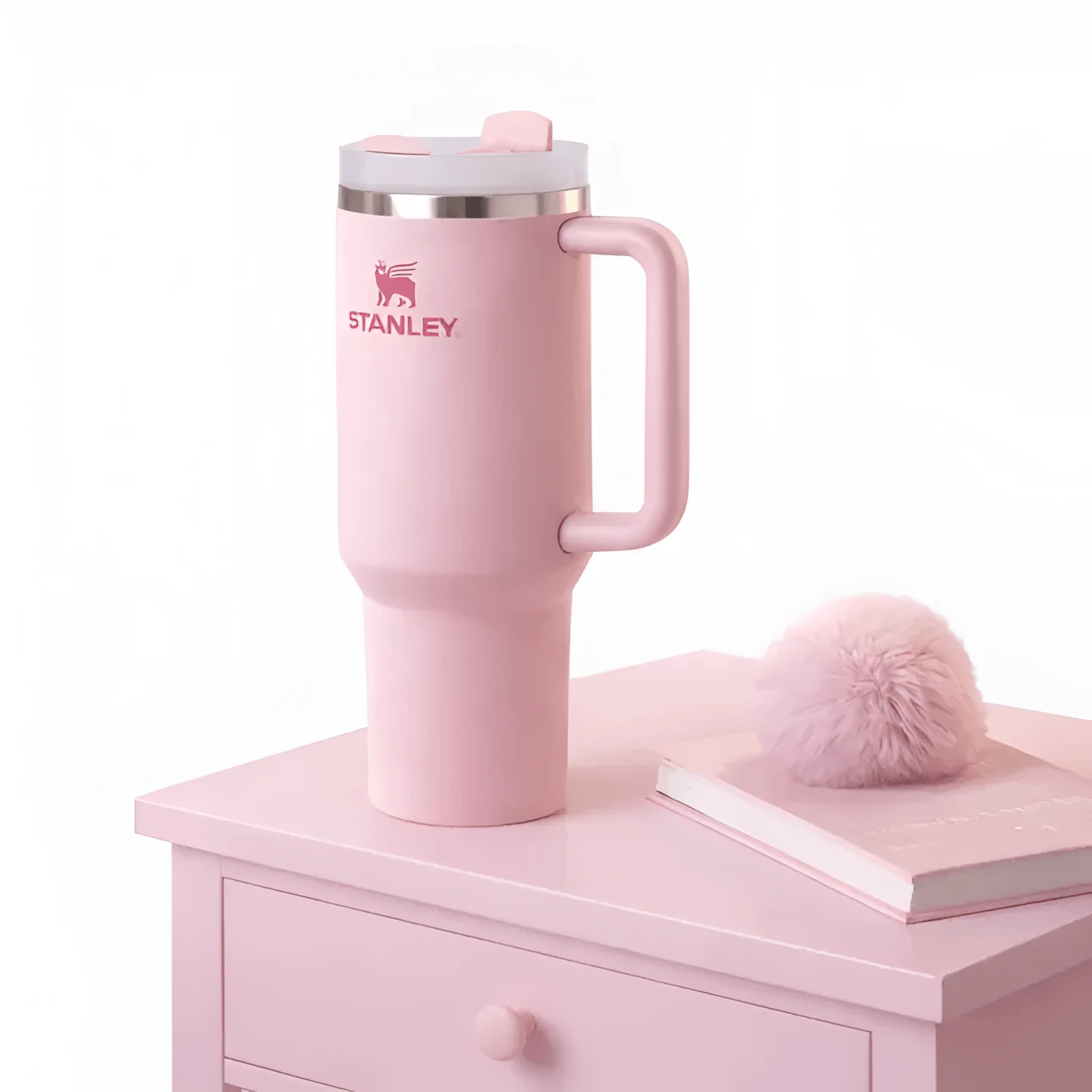 "40oz stainless steel tumbler with ergonomic handle, leak-resistant lid, and double-wall insulation."