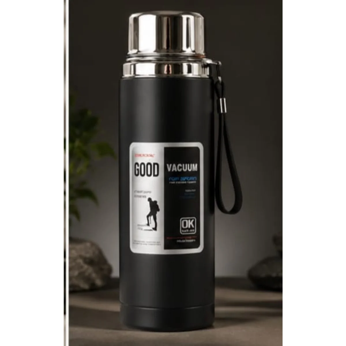 "Double-wall vacuum insulated stainless steel thermos bottle for hot and cold drinks."