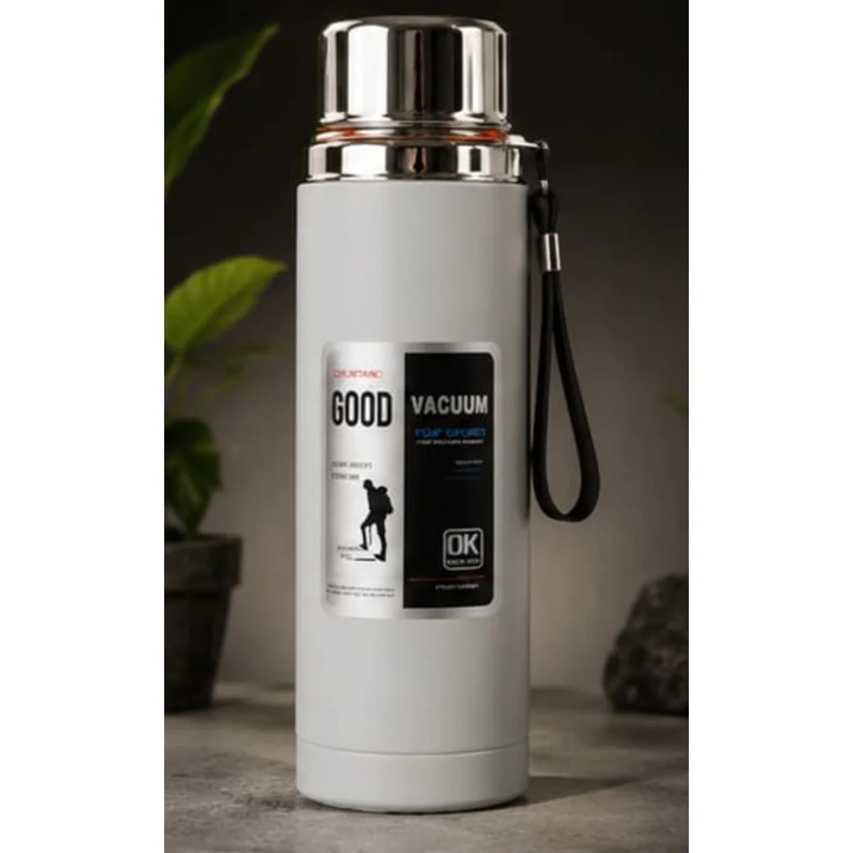 "Double-wall vacuum insulated stainless steel thermos bottle for hot and cold drinks."