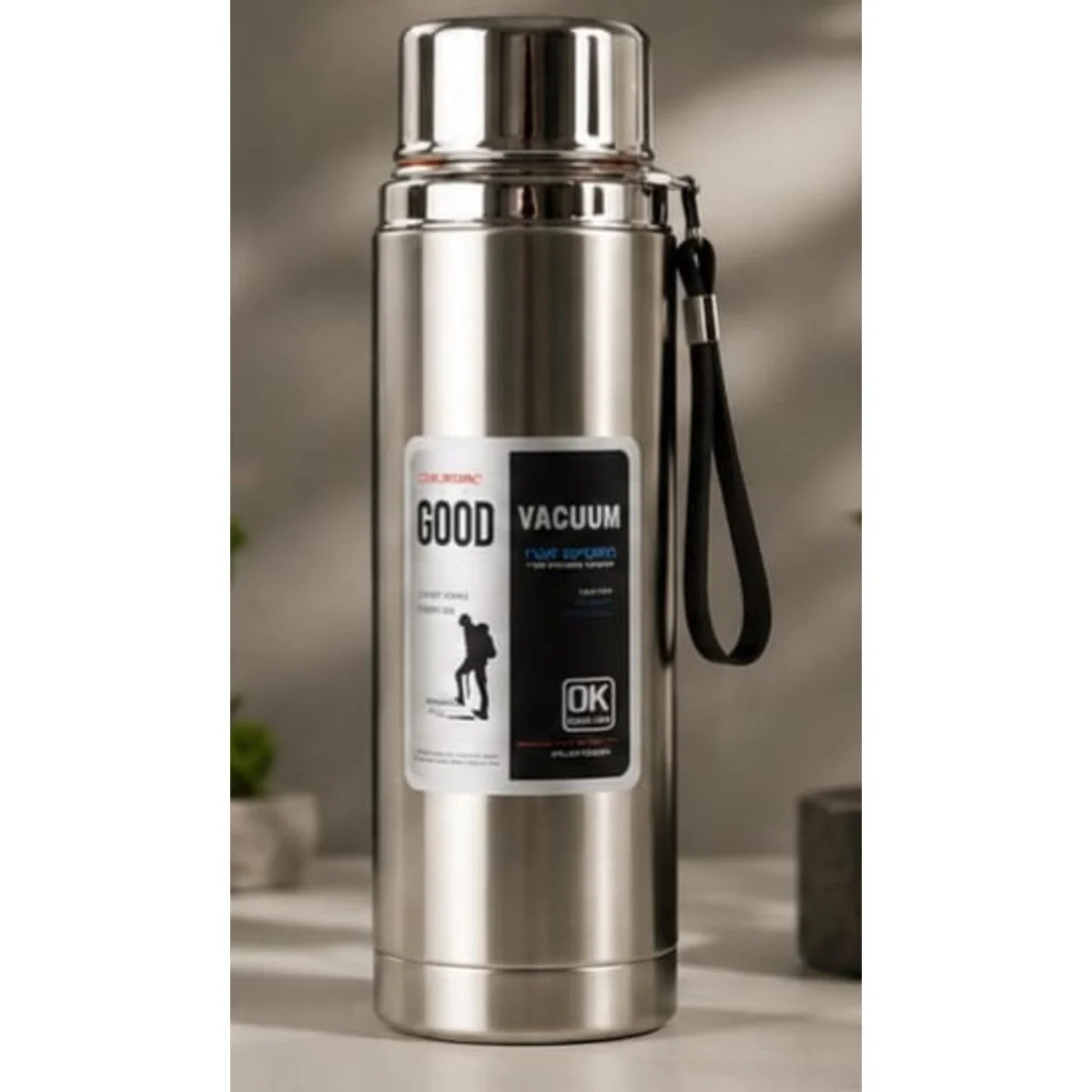 "Double-wall vacuum insulated stainless steel thermos bottle for hot and cold drinks."