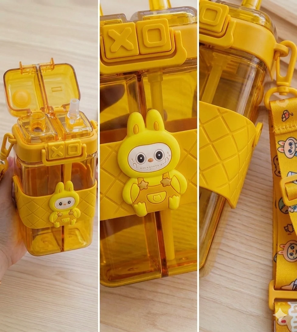 "Cute children's water bottle featuring two compartments, straw lid, bunny character, and carrying strap."